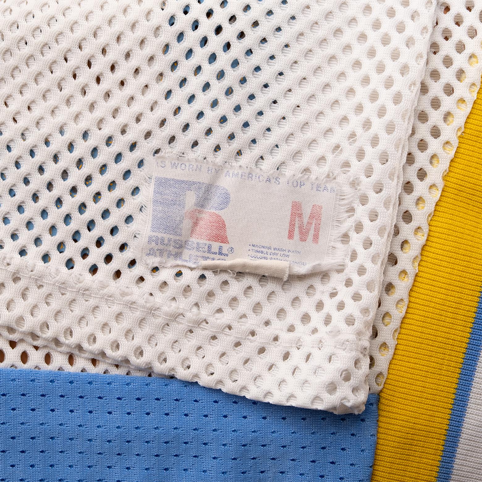 Russell Athletic Made in USA Medium label on 1980s Richmond football jersey.