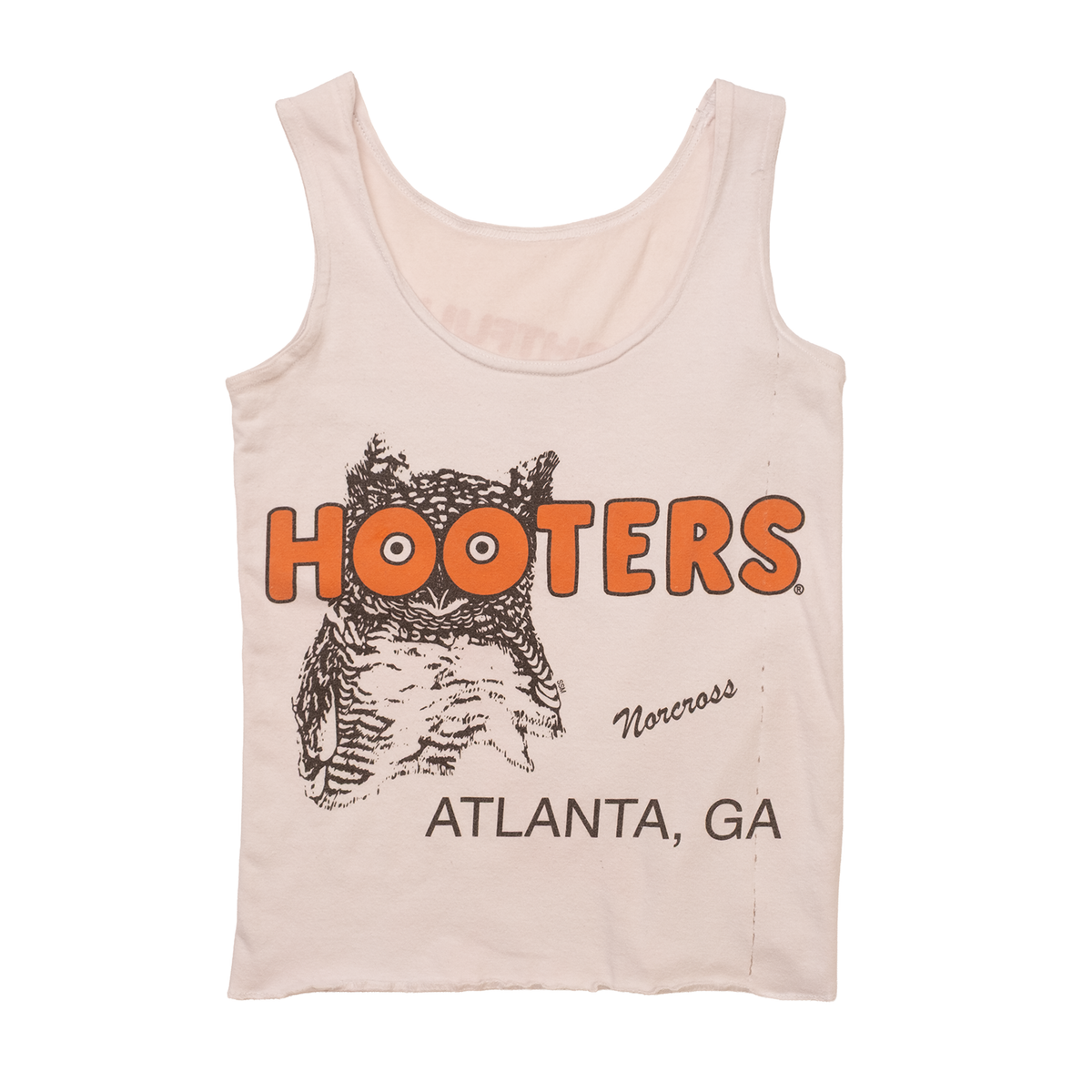 Front view of 1990s Hooters Norcross tank with owl logo on faded cream fabric.