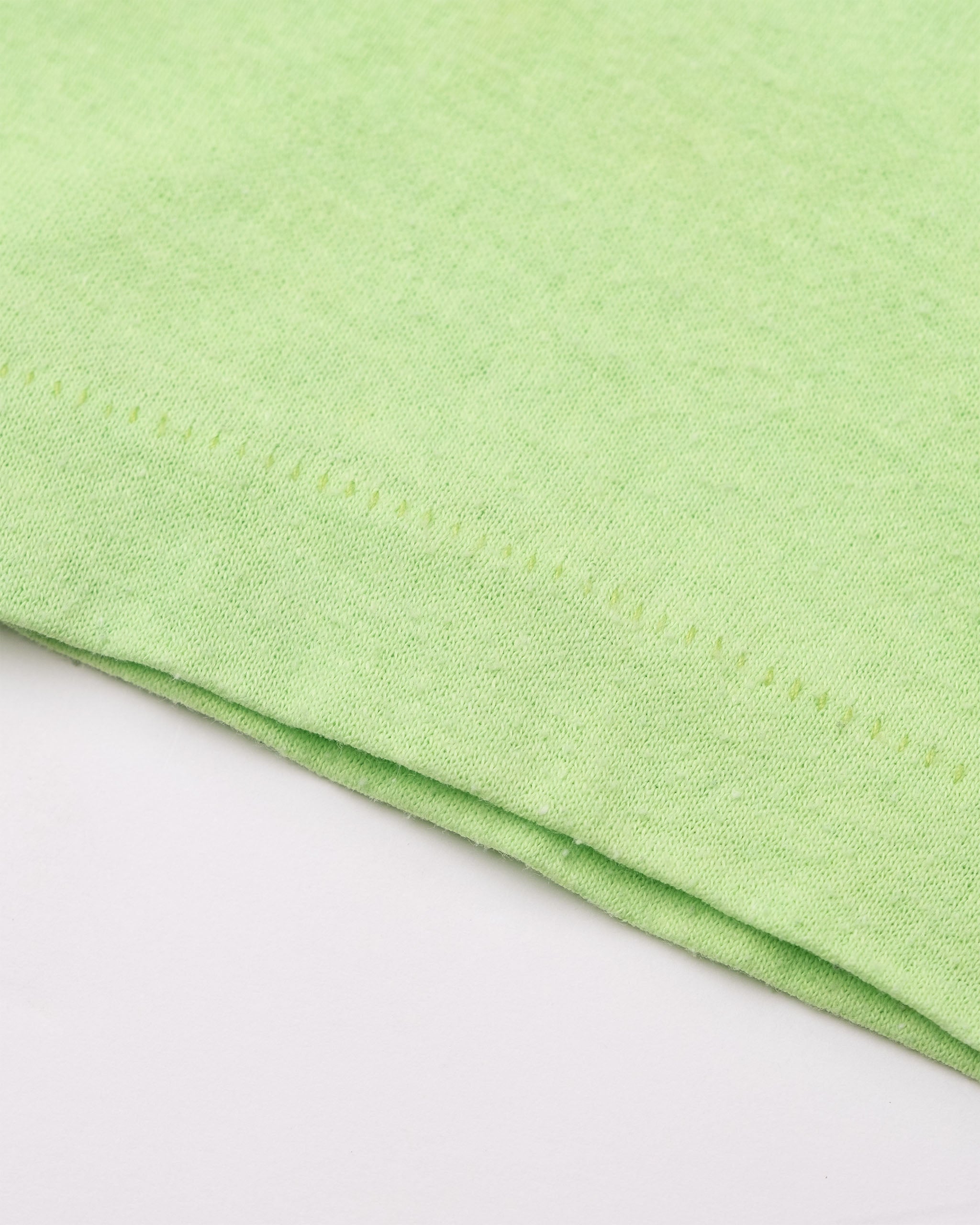 Single-stitch sleeve hem detail on vintage Made in USA Deja Vu Showgirls T-shirt.