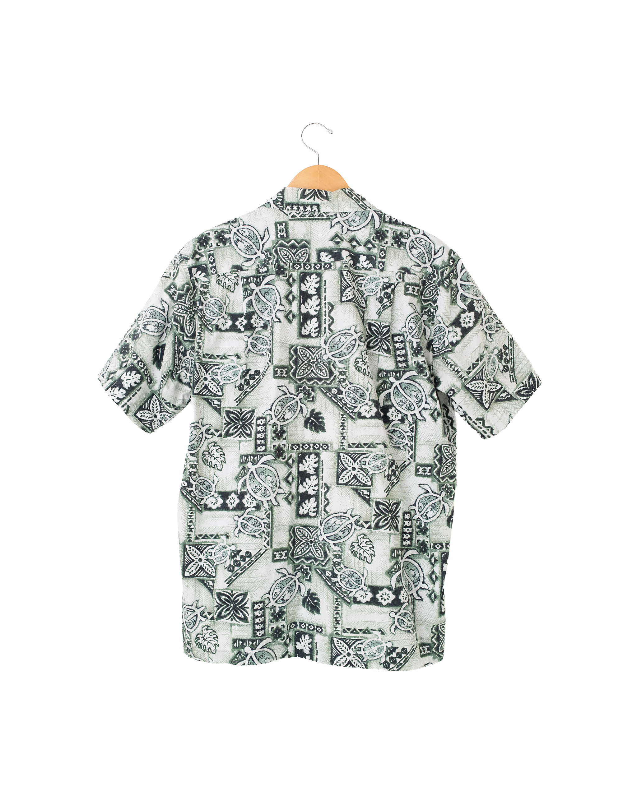 Back view of 1990s Made in Hawaii sea turtle aloha shirt with all-over tropical turtle print.
