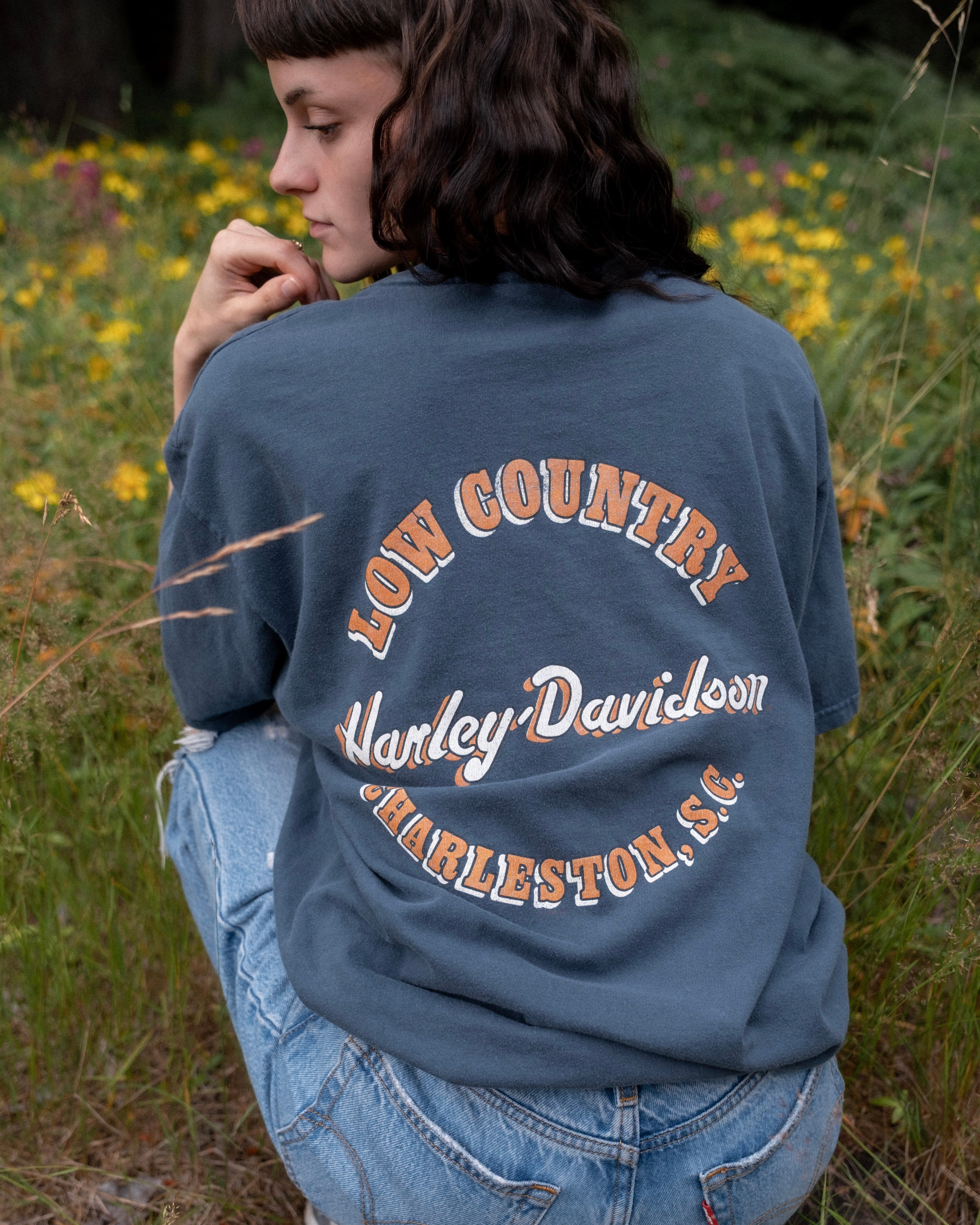 Back view of model wearing 1990s Harley-Davidson Low Country Charleston dealer tee.