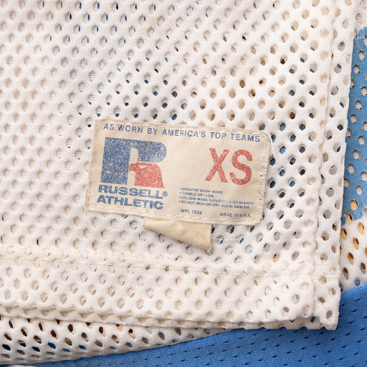 Russell Athletic Made in USA XS label on 1980s Richmond football jersey.