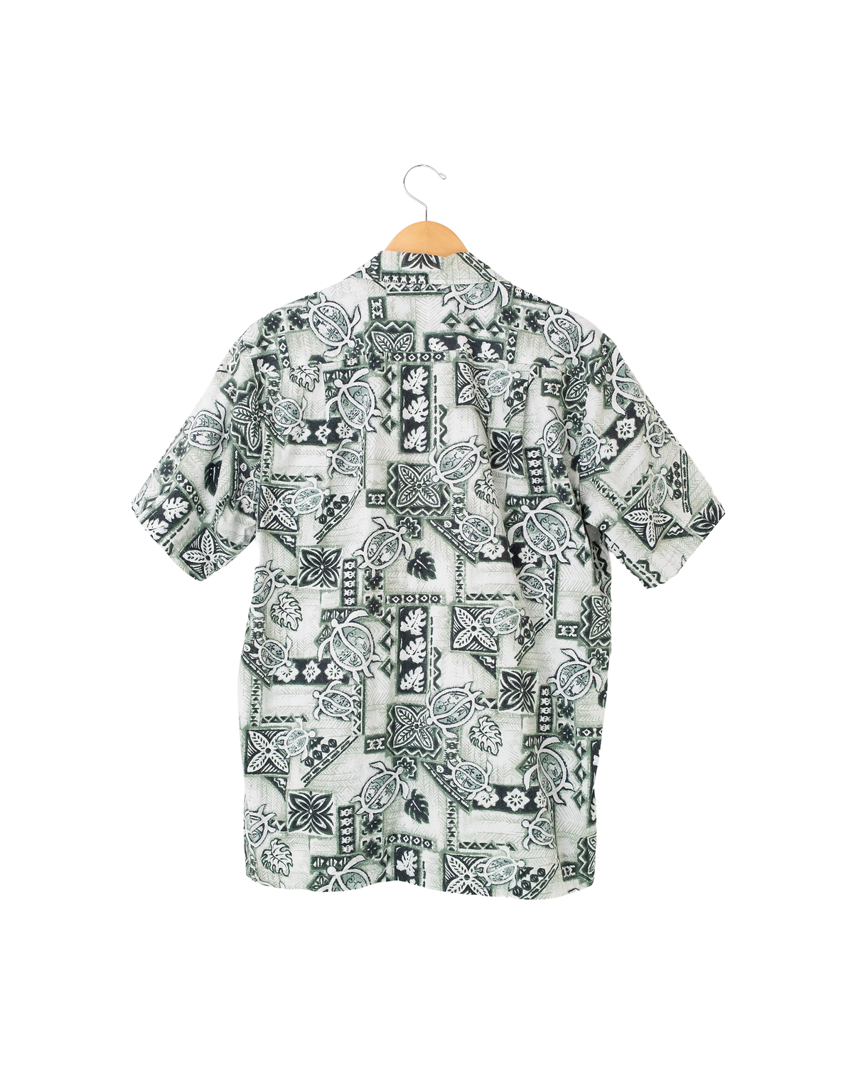 Back view of 1990s Made in Hawaii sea turtle aloha shirt with all-over tropical turtle print.